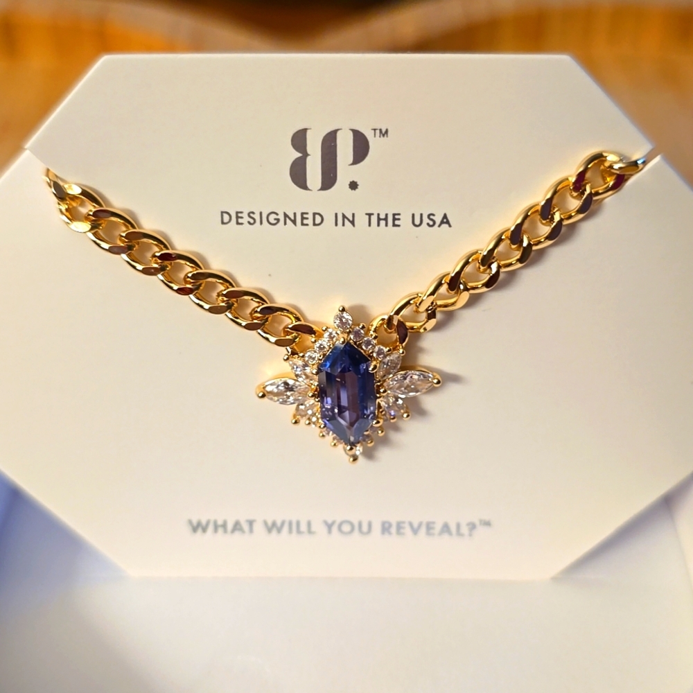 Elegant Gold Necklace with Blue Gemstone by BP